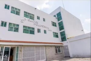 Suites Poliforum Inn